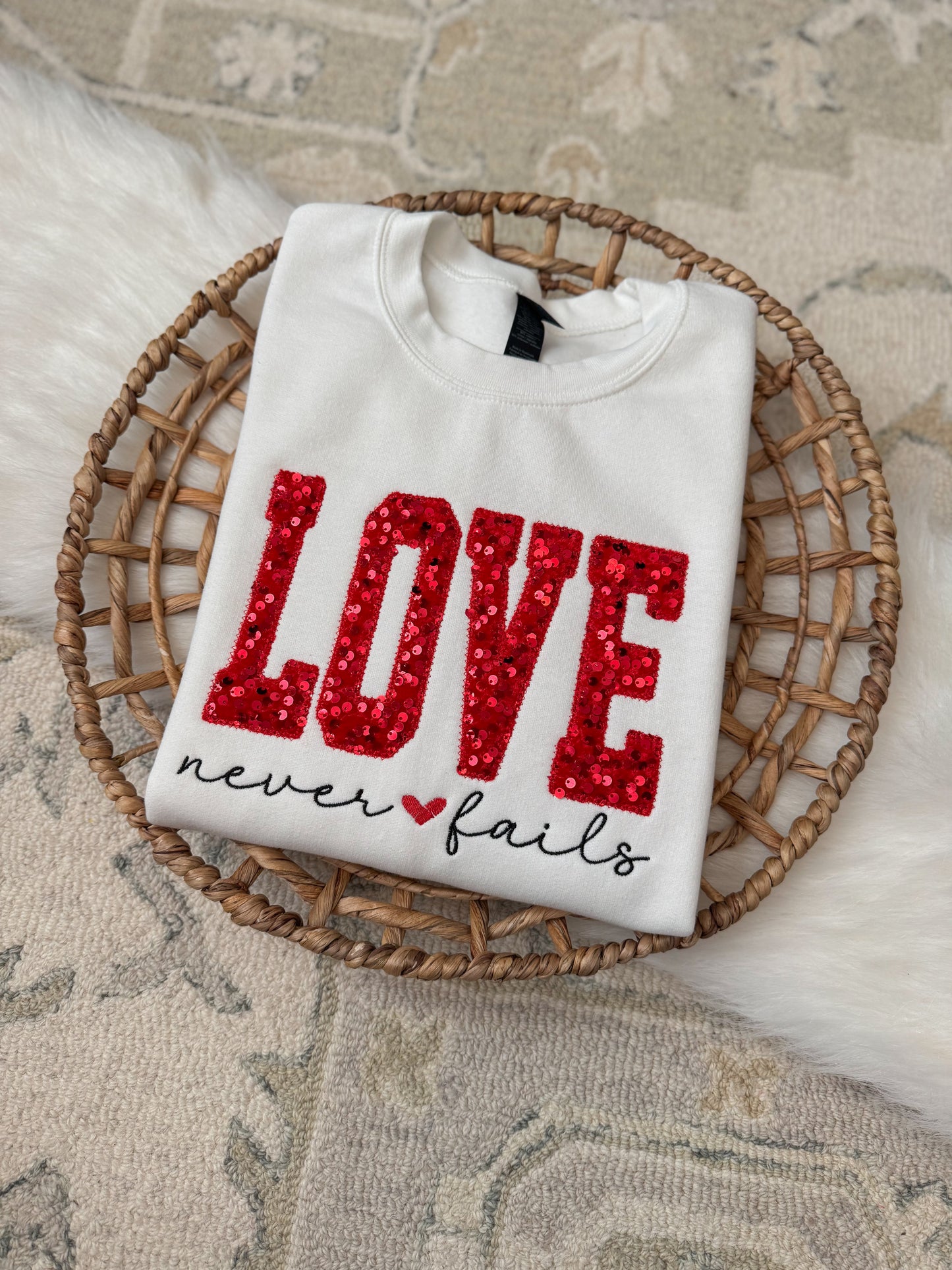 Love Never Fails Sweatshirt
