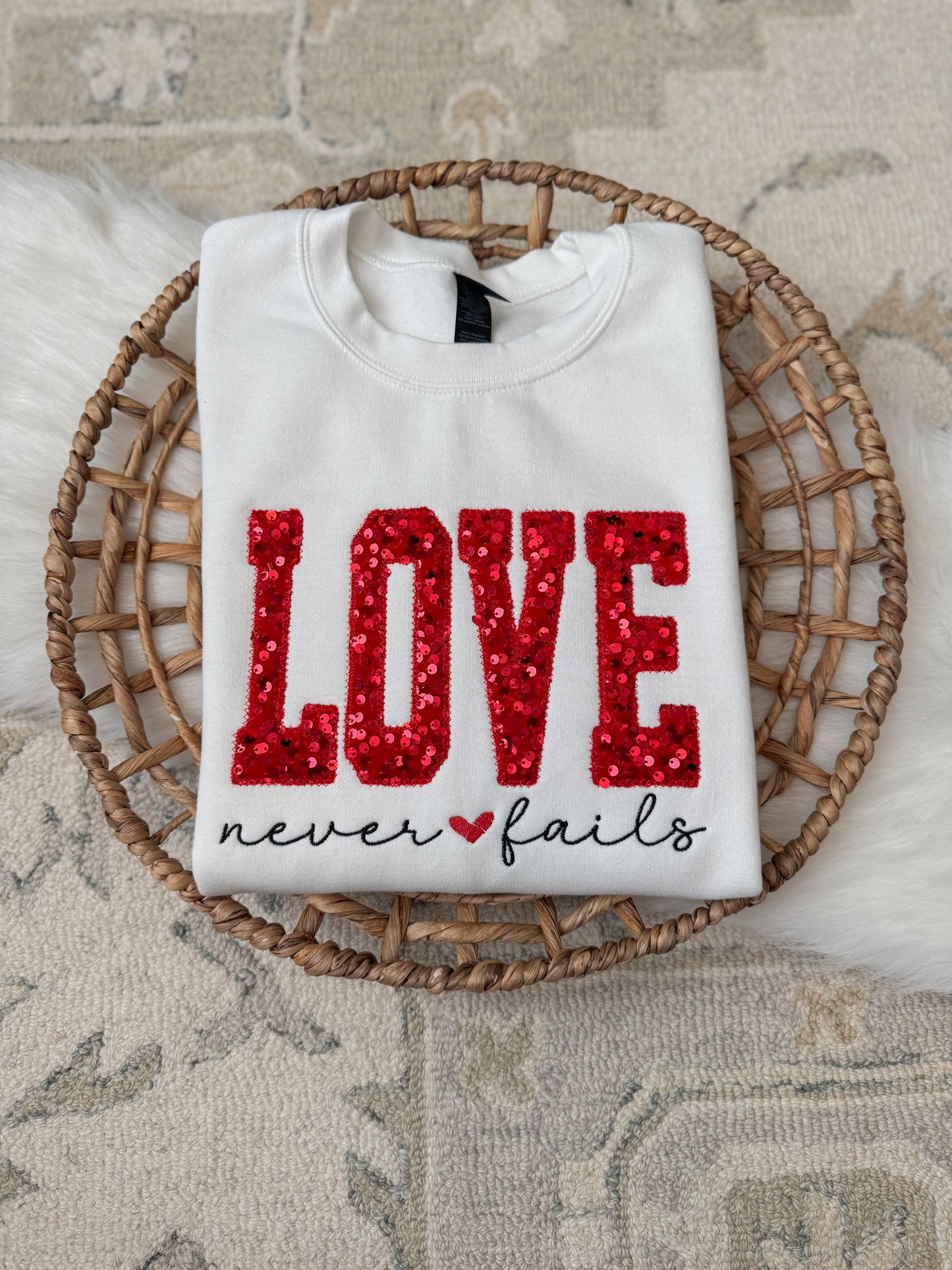 Love Never Fails Sweatshirt