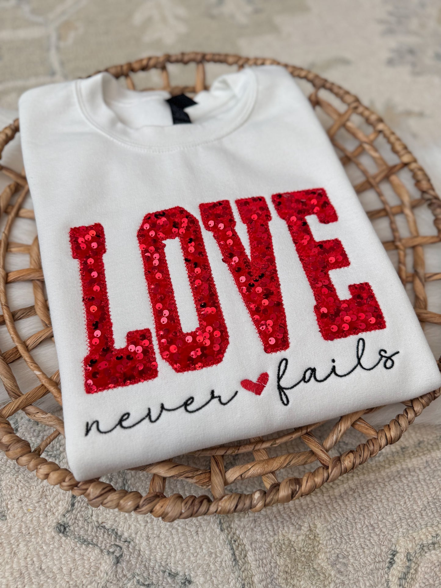 Love Never Fails Sweatshirt